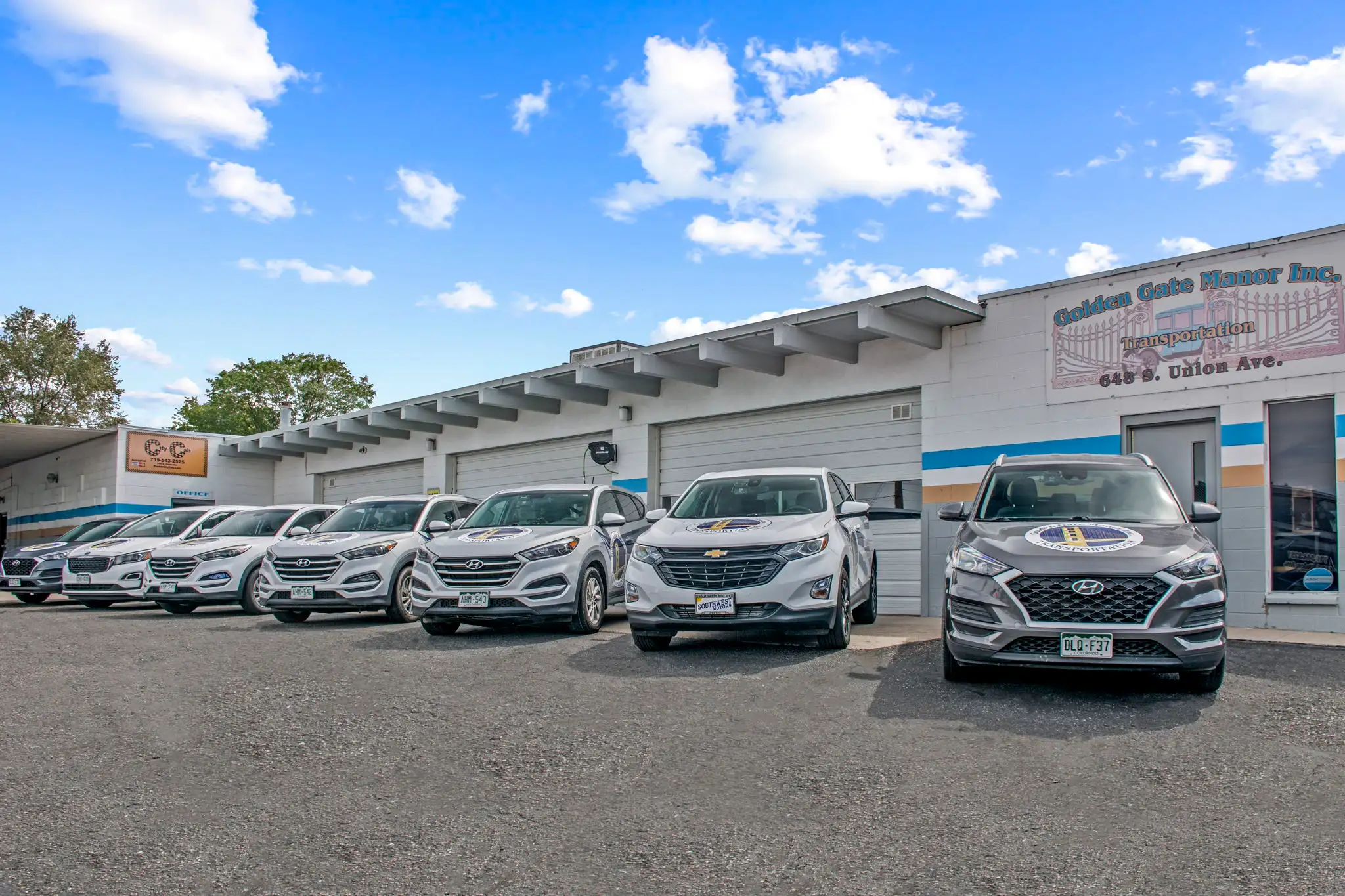 Golden Gate Manor cars lined up infront of our transportation hub building
