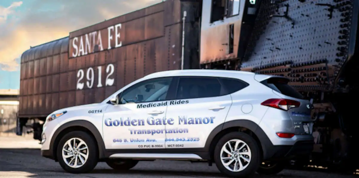 Transportation vehicle near the Sante Fe Train at the Pueblo train depo